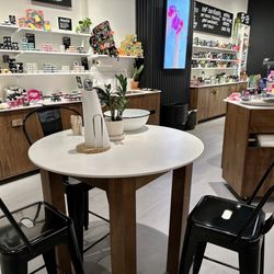 Lush - A table to sit and create your soap selection.