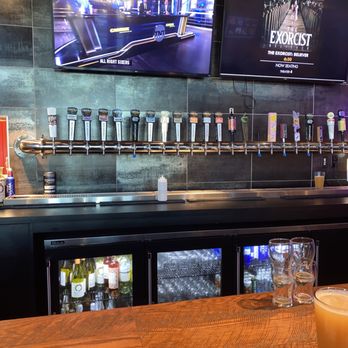 Flix Brewhouse - a bar with a large screen tv - Breweries Near Me - Oklahoma City, Oklahoma Flix Brewhouse - a bar with a large screen tv - Breweries Near Me - Oklahoma City, Oklahoma