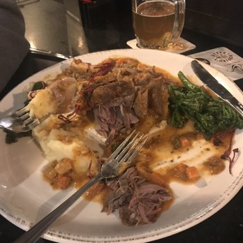 Westside Social - Braised lamb shank with mashed Yukon gold potatoes and broccolini - American Near Me - Grand Rapids, Michigan Westside Social - Braised lamb shank with mashed Yukon gold potatoes and broccolini - American Near Me - Grand Rapids, Michigan