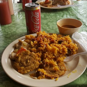 El Algarrobo - Rice and beans with tostones and chicken with a soda for 5.50. - Puerto Rican Near Me - San Lorenzo, Puerto Rico
