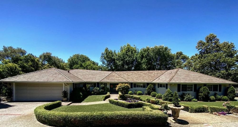 Slide of Exclusively Roofing