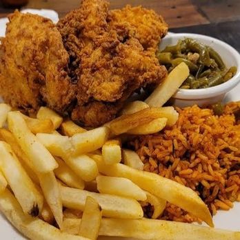 Nigel’s Good Food - Hanahan - Fried pork chop, dirty rice, green beens, and French fries. - Soul Food Near Me - Hanahan, South Carolina