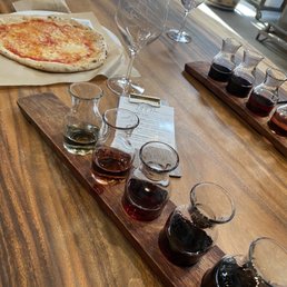 Wine flight and cheese pizza during their pizza Wednesday night. Wine flight and cheese pizza during their pizza Wednesday night.