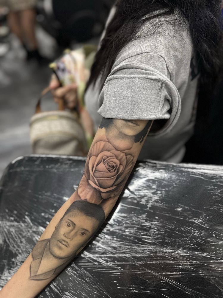 Revision Body Art Logo