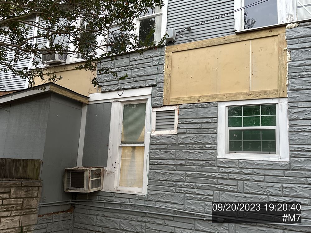 Slide of Busse Roofing