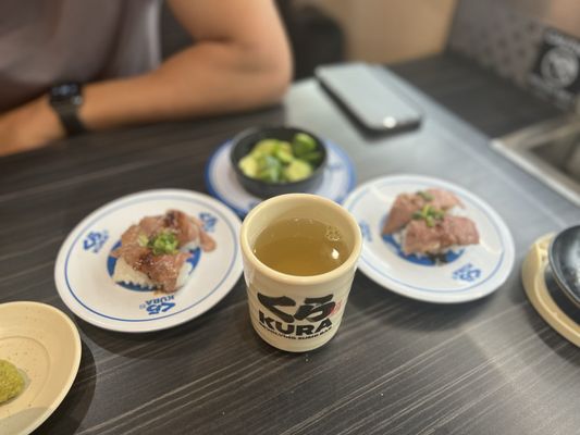 Kura Revolving Sushi Bar by null