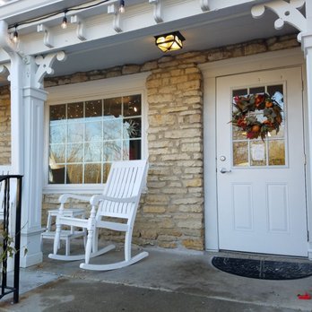 Long Grove Coffee - The entrance to the Long Grove Coffee Co.! A nice rocking chair and seasonal wreath welcome us as we walk in. - Coffee & Tea Near Me - Long Grove, Illinois Long Grove Coffee - The entrance to the Long Grove Coffee Co.! A nice rocking chair and seasonal wreath welcome us as we walk in. - Coffee & Tea Near Me - Long Grove, Illinois
