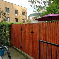Advent Fence Company - Wood fence with redwood stain