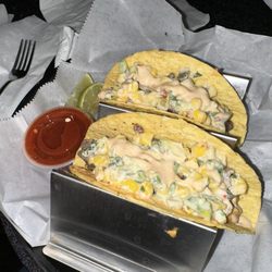 Foster's Main Street Tavern - 4/9/24.  Taco Tuesday special (carne asada) with chili sauce.  Messy but tasty.