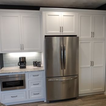 Kitchen Emporium - a stainless steel refrigerator in a kitchen - Cabinetry Near Me - Portsmouth, Virginia Kitchen Emporium - a stainless steel refrigerator in a kitchen - Cabinetry Near Me - Portsmouth, Virginia
