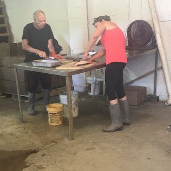 Grant's Oyster House - a man and a woman in a workshop - Seafood Markets Near Me - Sneads Ferry, North Carolina Grant's Oyster House - a man and a woman in a workshop - Seafood Markets Near Me - Sneads Ferry, North Carolina