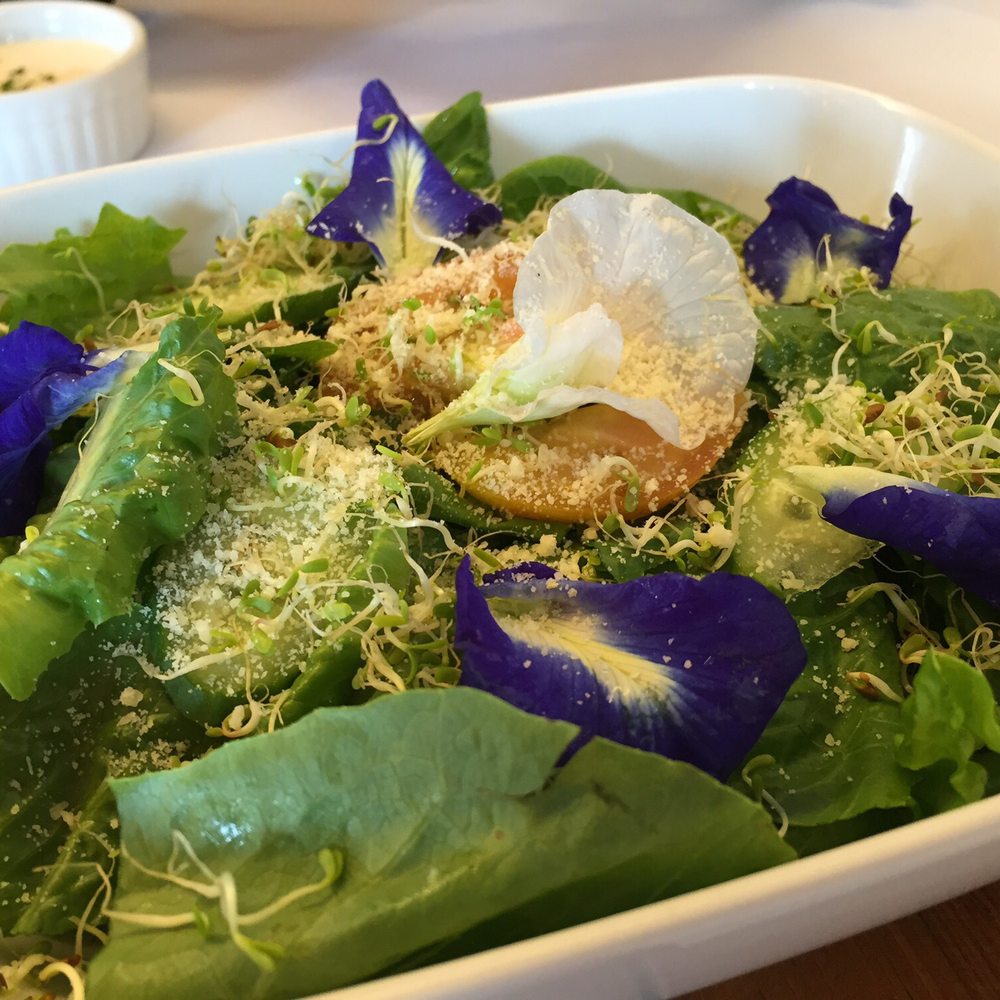 Faustina's - Love salads with edible flowers...  Great starter! - Steakhouses Near Me - Los Baños, LAG