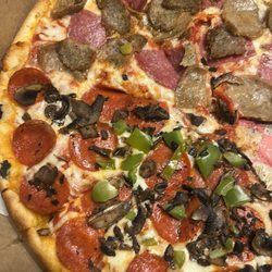 Park Avenue Pizza - Large with half and half with sausage salami pepperoni green peppers olives