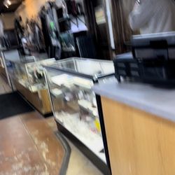 Bountiful Pawn & Sales - This freak never got off his personal phone call to assist me. 10 minutes later I left.