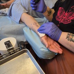 Tattoo City Skin Art Studio art by Larry Brogan