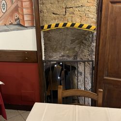 Trattoria La Torre - Entrance of the cellar