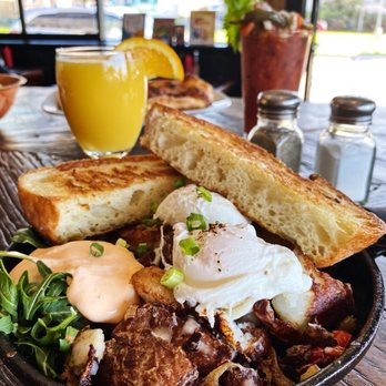 Philomena - Pork Belly Hash with Poached egg, Griddle Toast, and Spicy Calabrian Sour Creme! - Pizza Near Me - Oakland, California Philomena - Pork Belly Hash with Poached egg, Griddle Toast, and Spicy Calabrian Sour Creme! - Pizza Near Me - Oakland, California