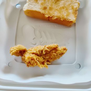 Raising Cane's Chicken Fingers - The Chicken tender is dwarfed by the toast. - Chicken Wings Near Me - Monrovia, California Raising Cane's Chicken Fingers - The Chicken tender is dwarfed by the toast. - Chicken Wings Near Me - Monrovia, California