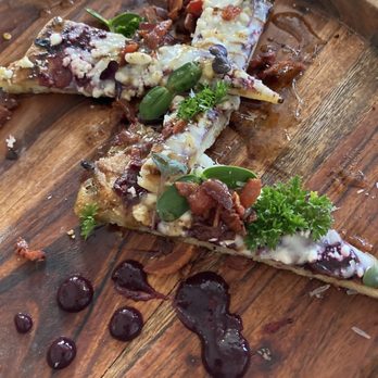 Tua Pasta - Flatbread appetizer to start with cheese, bacon, fruit preserve, and honey. - Italian Near Me - Bartow, Florida