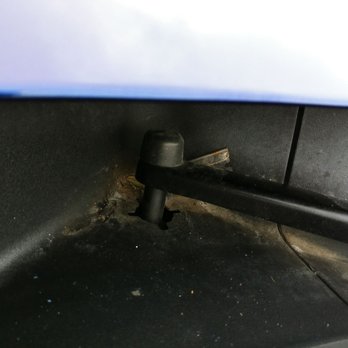Francis Collision Centre - Rusty razor blade left on window cowl by wiper arm - Body Shops Near Me - Fresno, California