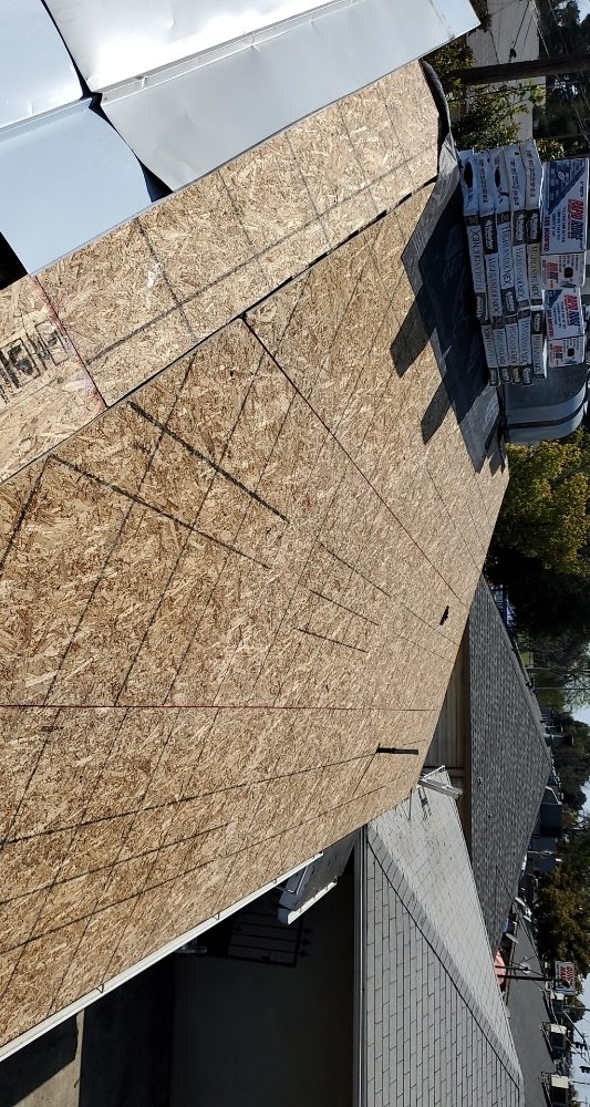 Slide of Hi-Tech Roofing Services