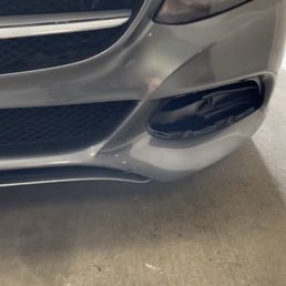 The first vehicle where a piece of the grill just happened to fall out