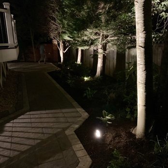Acclaim Home Services - Night view with patio and all the installed lights. - General Contractors Near Me Acclaim Home Services - Night view with patio and all the installed lights. - General Contractors Near Me