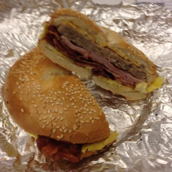 The Bagel Man - Egg and Cheese with Bacon AND Ham AND Sausage on a Sesame Bagel. Look at that cross-section! Do it - Delis Near Me - Phoenix, Arizona The Bagel Man - Egg and Cheese with Bacon AND Ham AND Sausage on a Sesame Bagel. Look at that cross-section! Do it - Delis Near Me - Phoenix, Arizona