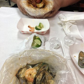 The Crawfish Guy - Yummm!!! Muscles and shrimp in garlic butter for me, crawfish and shrimp for him in medium sauce... wonderful!!! - Cajun/Creole Near Me - Fresno, California