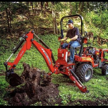 GMS Hardscaping - a man operating a small red excavator - Landscaping Near Me - Frenchtown, New Jersey GMS Hardscaping - a man operating a small red excavator - Landscaping Near Me - Frenchtown, New Jersey