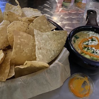 Torchy's Tacos - Green Chile Queso And Chips- half order - Tex-Mex Near Me - Austin, Texas