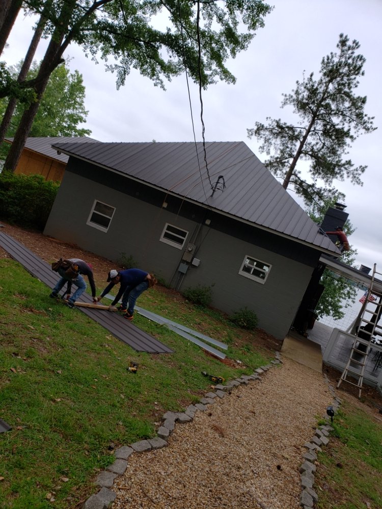 Slide of Ram's Roofing Service