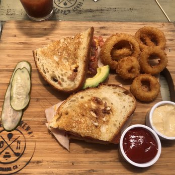 Feast and Fareway - Turkey sandwich on sourdough and onion rings - American Near Me - Coronado, California