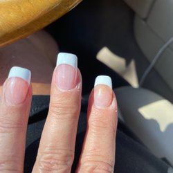 Lush Hair and Nails - Nail repair but not the right shape.