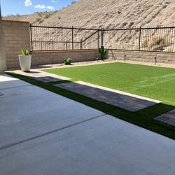 Eagle Masonry & Fence - Complete back yard, pavers, turf grass and rock