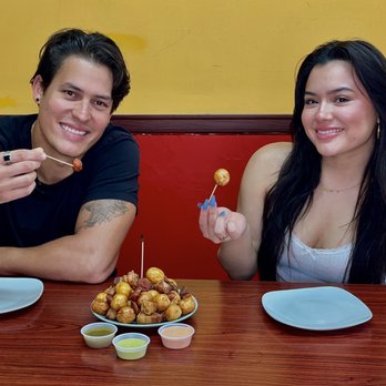 Martha's Courthouse Cafe - man and a woman eating food - Colombian Near Me - Miami, Florida Martha's Courthouse Cafe - man and a woman eating food - Colombian Near Me - Miami, Florida