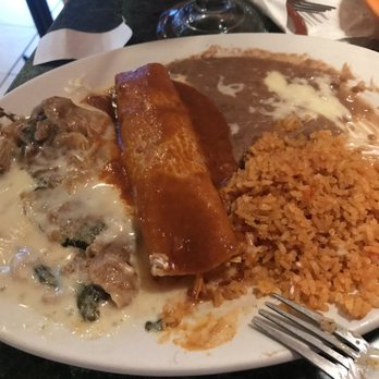 El Potro Mexican Restaurant - Chili relleno stuffed with cheese but covered in queso , chicken enchilada - Mexican Near Me - Savannah, Georgia