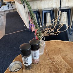 Every table is live-edge and comes with these decor