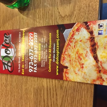 Dolce Pizza - a menu and a bottle of soda - Pizza Near Me - East Orange, New Jersey Dolce Pizza - a menu and a bottle of soda - Pizza Near Me - East Orange, New Jersey