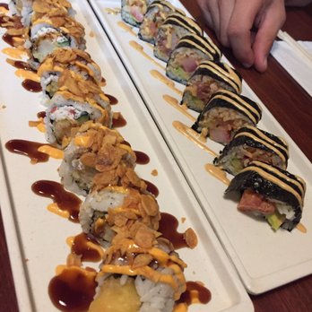 Ginza Sushi - Garlic crunch roll (left) Spicy Hamachi (right) - Sushi Bars Near Me - Honolulu, Hawaii Ginza Sushi - Garlic crunch roll (left) Spicy Hamachi (right) - Sushi Bars Near Me - Honolulu, Hawaii