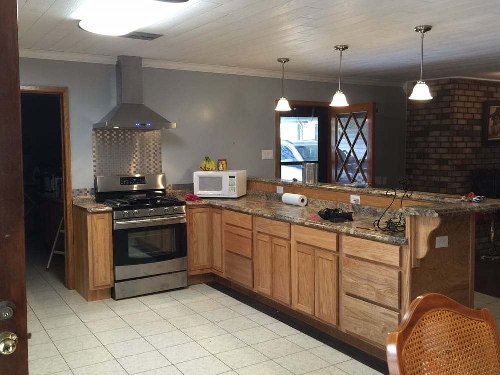 Slide of Randy's Total Renovations