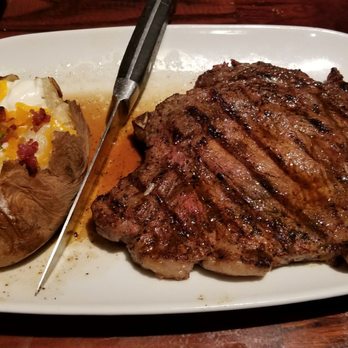 LongHorn Steakhouse - Bone-in Ribeye with a Loaded Baked Potato! Delicious! - Steakhouses Near Me - Denham Springs, Louisiana LongHorn Steakhouse - Bone-in Ribeye with a Loaded Baked Potato! Delicious! - Steakhouses Near Me - Denham Springs, Louisiana