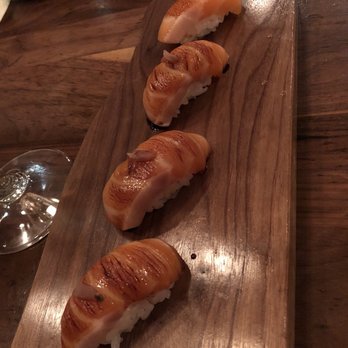 Uchi Dallas - Salmon belly nigir with Tamara and Sakura - Japanese Near Me - Dallas, Texas Uchi Dallas - Salmon belly nigir with Tamara and Sakura - Japanese Near Me - Dallas, Texas
