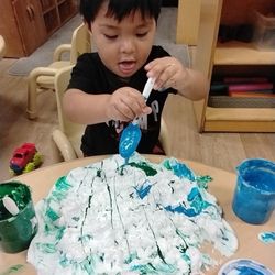 Busy Bees South Phoenix Child Care Center - My son painting with shaving cream!