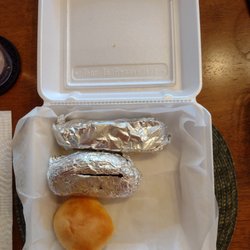 Sam's Food & Spirits - Carry-out salmon which was small, overcooked baked potato and dry/flavorless biscuit.