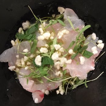ABC Cocina - Raw shaved fluke with green chili dressing, crunchy rice and herbs - Latin American Near Me - New York, New York ABC Cocina - Raw shaved fluke with green chili dressing, crunchy rice and herbs - Latin American Near Me - New York, New York
