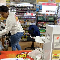 Kittrell Food Mart - The cashiers area with tobacco and lottery.