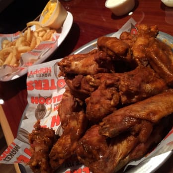 Hooters - 20pc 911 and curly fries with cheese. Always hits the spot! - Sports Bars Near Me - Orlando, Florida Hooters - 20pc 911 and curly fries with cheese. Always hits the spot! - Sports Bars Near Me - Orlando, Florida
