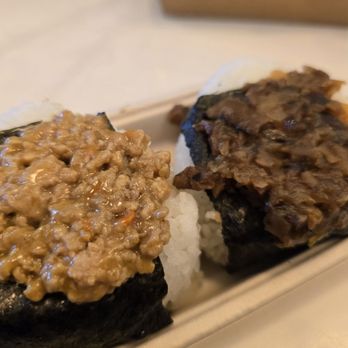 Tadaima - Marina - (Left to right) Chicken Curry Onigiri & Mushroom and Pickled Daikon Onigiri - Cafes Near Me - San Francisco, California Tadaima - Marina - (Left to right) Chicken Curry Onigiri & Mushroom and Pickled Daikon Onigiri - Cafes Near Me - San Francisco, California