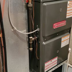 Phillips Services - This is the flooding damage to the new equipment as the condensating pan is overflowing in through the furnace all the way to the floor